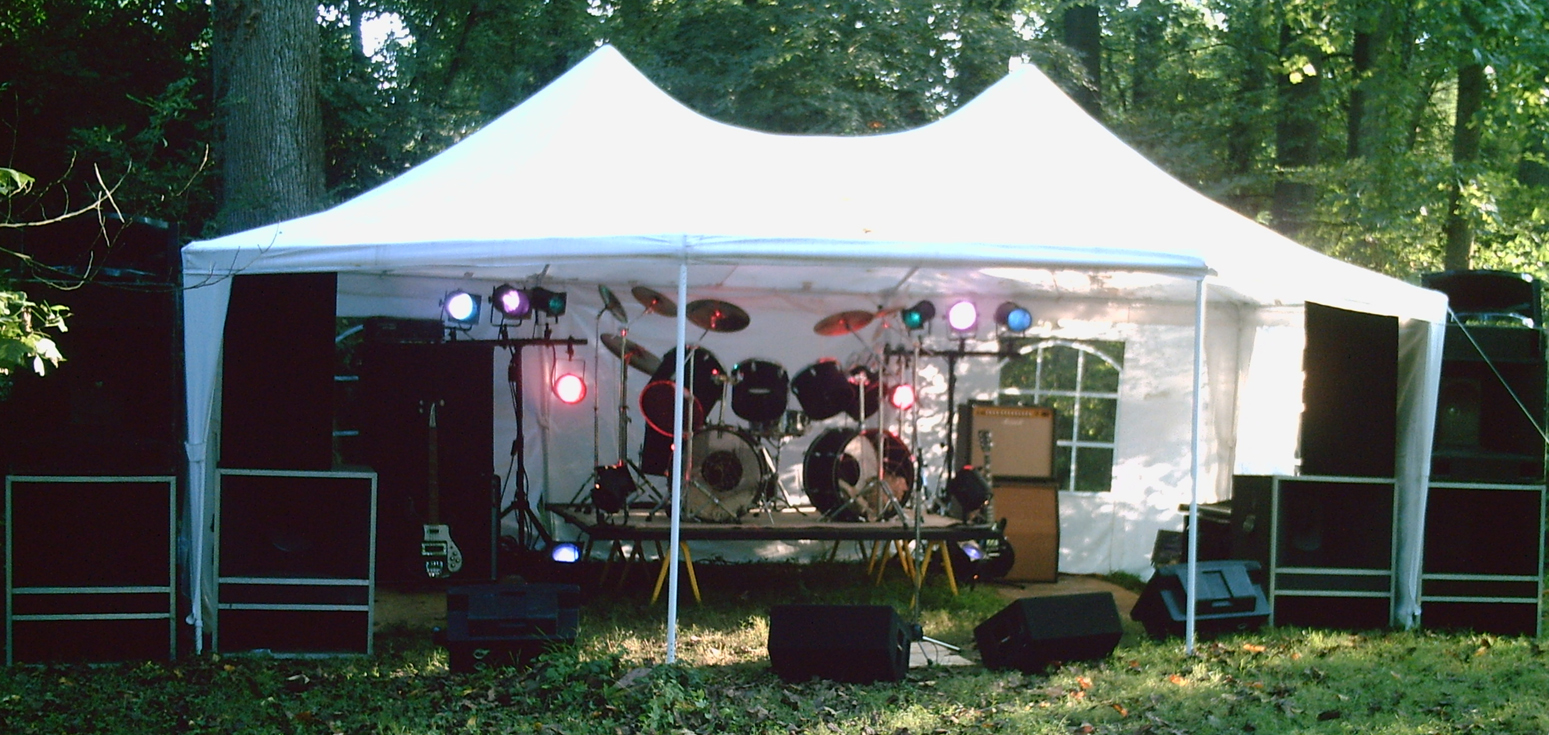 Image of a live stage set up in a tent